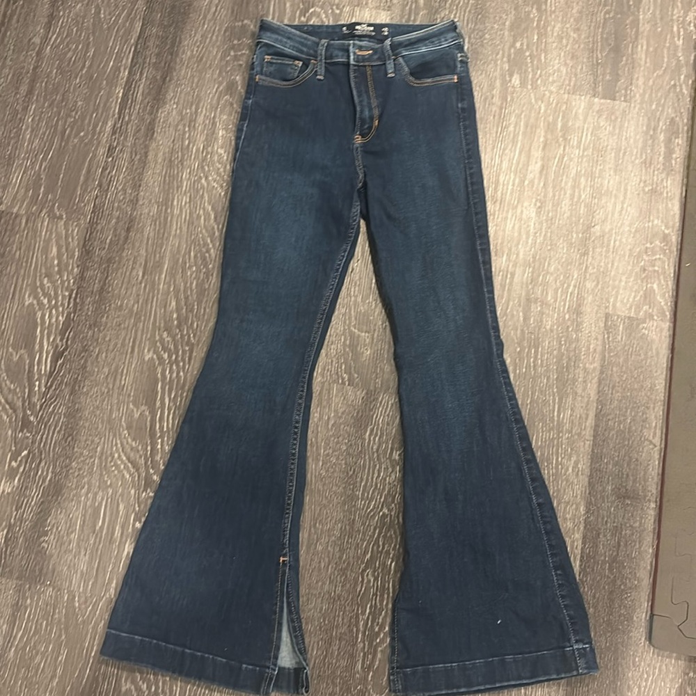 Hollister flare jeans. Dark wash and tight on the thigh.